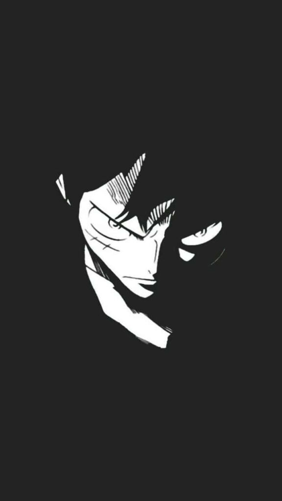 The Bold and Determined Leader: Luffy, the Iconic Straw Hat Pirates Captain, in Captivating Monochrome Wallpaper