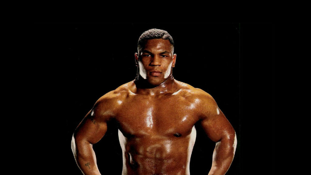 Mighty Mike: A Timeless Tribute to Iron Mike Tyson's Youthful Power Wallpaper