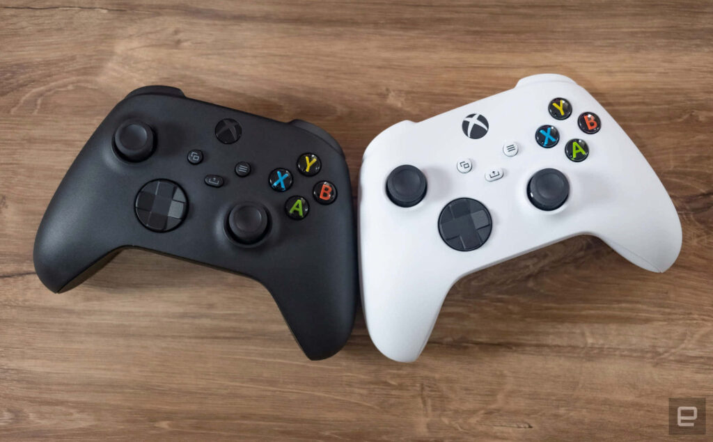 Xbox Controllers on a Wooden Minimal Background Wallpaper