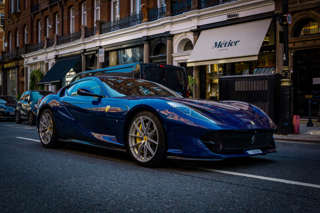 Unveiling the Timeless Elegance: Immerse Yourself in the Luxurious Ferrari Lifestyle through this Captivating Shot Wallpaper