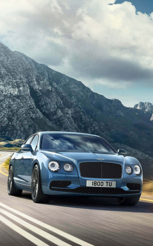 Majestic Bentley Flying Spur Embodies Perfection on an Idyllic Open Road Wallpaper