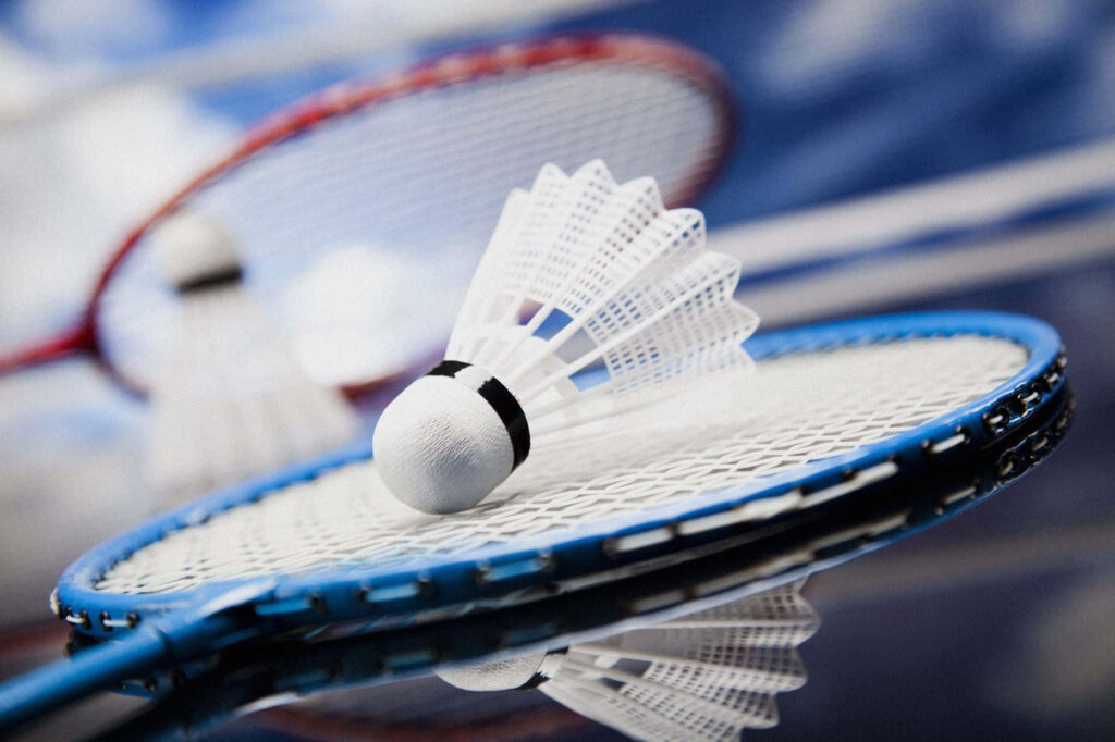 Red and Blue Badminton Shuttlecock Background Wallpaper