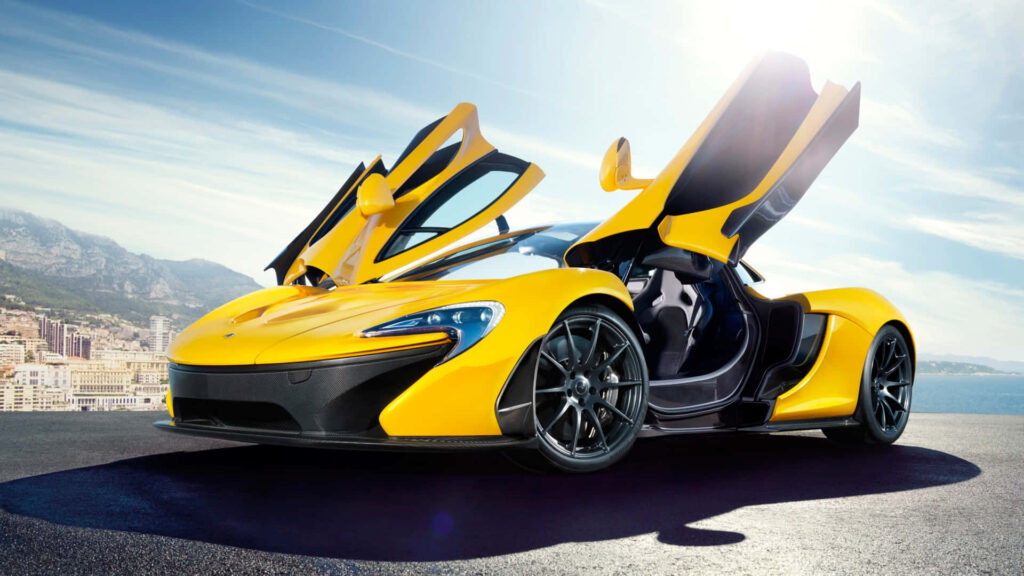 Powerful Elegance: Showcasing the Speed and Style of a Cutting-Edge 2020 Yellow Mclaren Sports Car Wallpaper