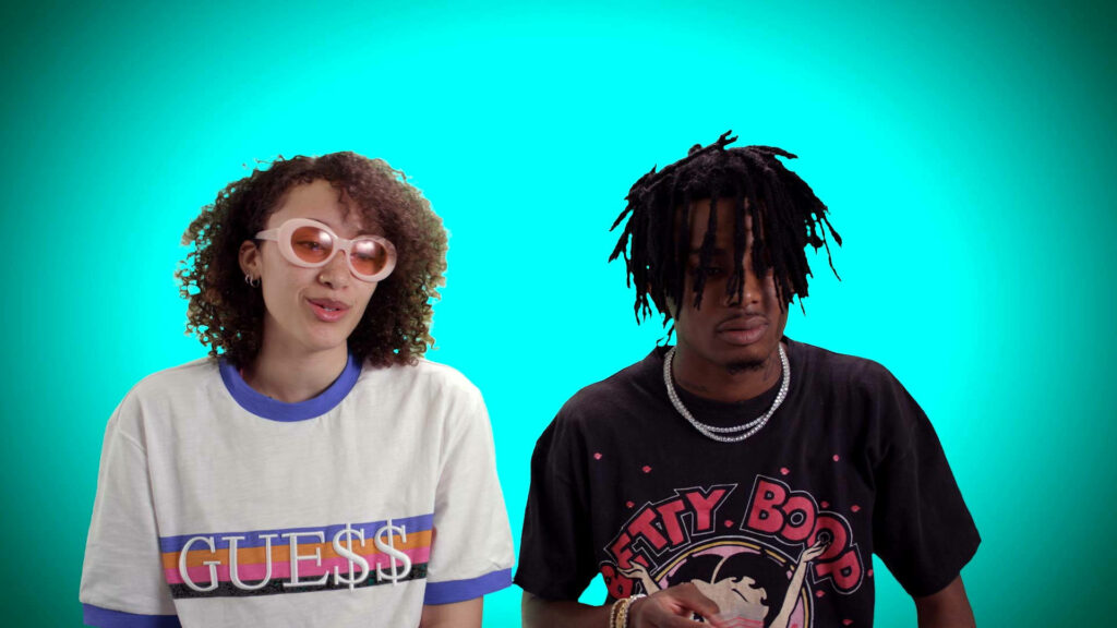 Urban Style: Playboi Carti Lookalikes in Teal Background - Vibrant, Casual Fashion Duo Wallpaper