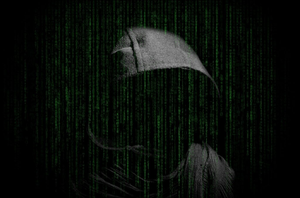 The Gray Hooded Hacker: A Computer Wallpaper Background Photo