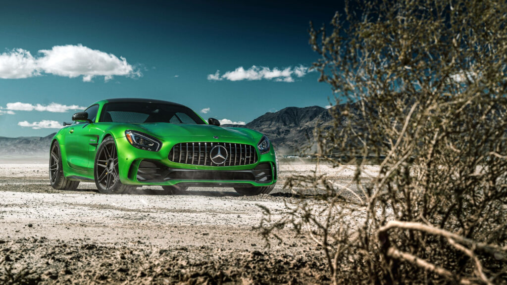 Unleashing the Ferocious Power: Mercedes AMG GTR Roaring in Green Hell Magno Wallpaper