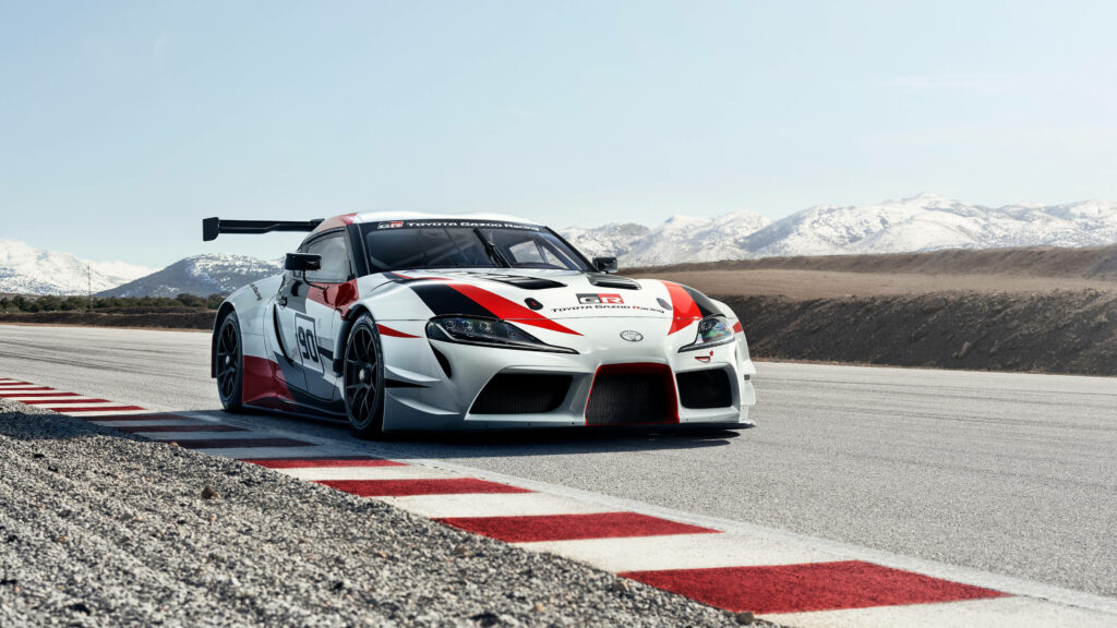 Speed and Scenery: The Supra Racing Concept Takes on the Mountains in 4K Wallpaper