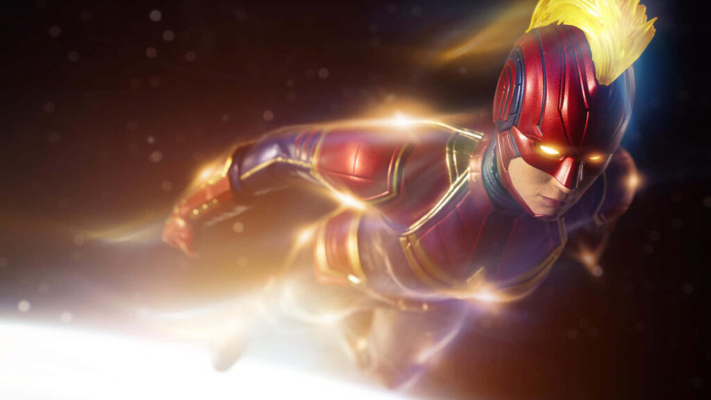 Witness Captain Marvel's Unparalleled Powers and Unrivaled Heroism in Action Wallpaper