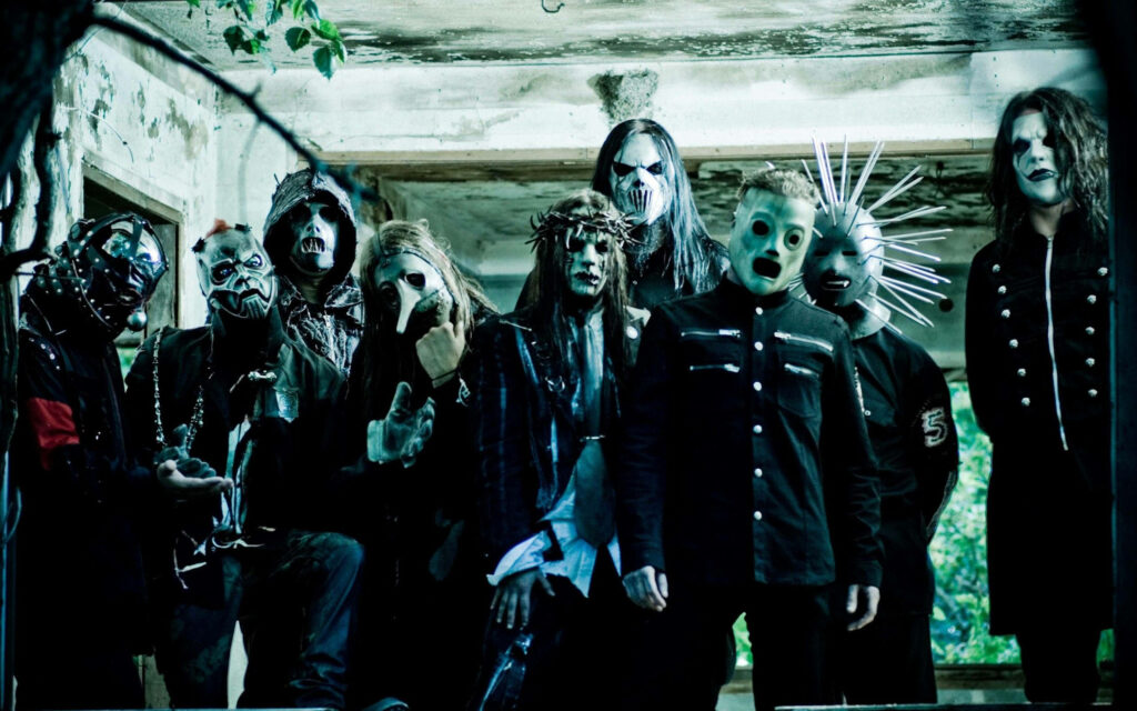 Unmasked in the Ruins: Slipknot Members Converge at Abandoned Building Wallpaper