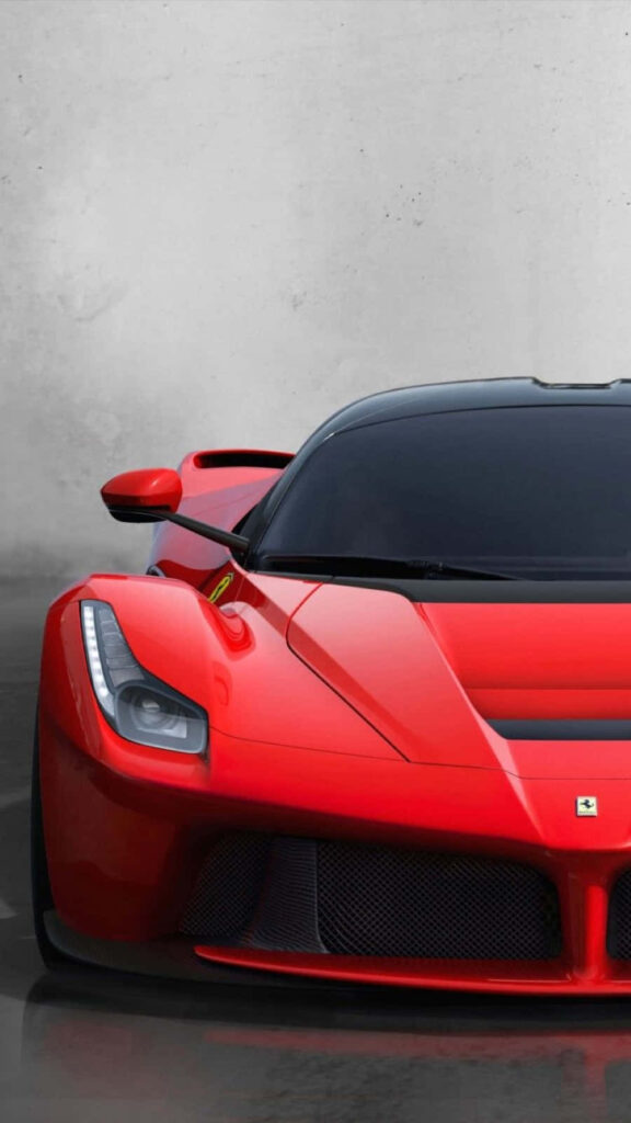 Unleashing the Power: The Spectacular Red Ferrari LaFerrari Defies All Limits in Breathtaking Contrast Wallpaper