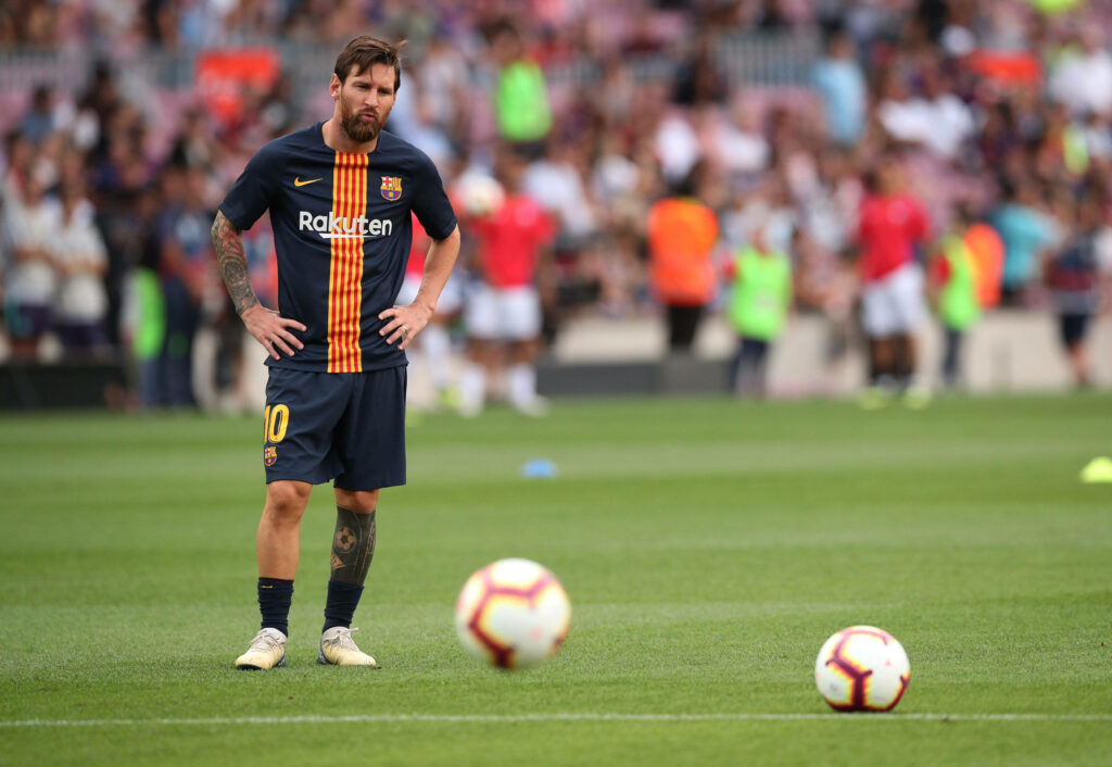 The Iconic Messi in Action: Capturing the Spirit of Football in 2020 Wallpaper
