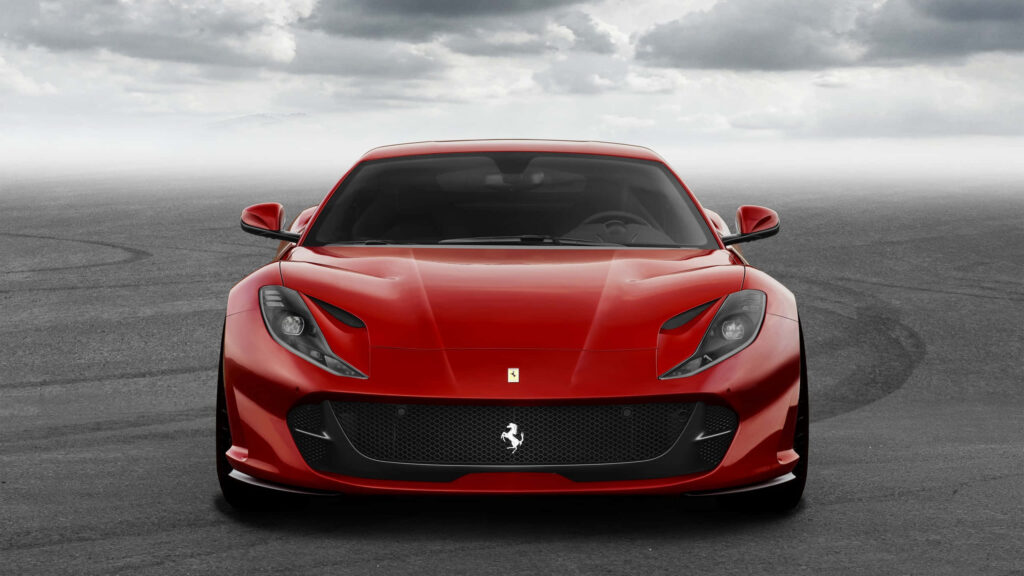 Experiencing Exquisite Italian Luxury: The Captivating Ferrari Portofino in Passionate Red Wallpaper