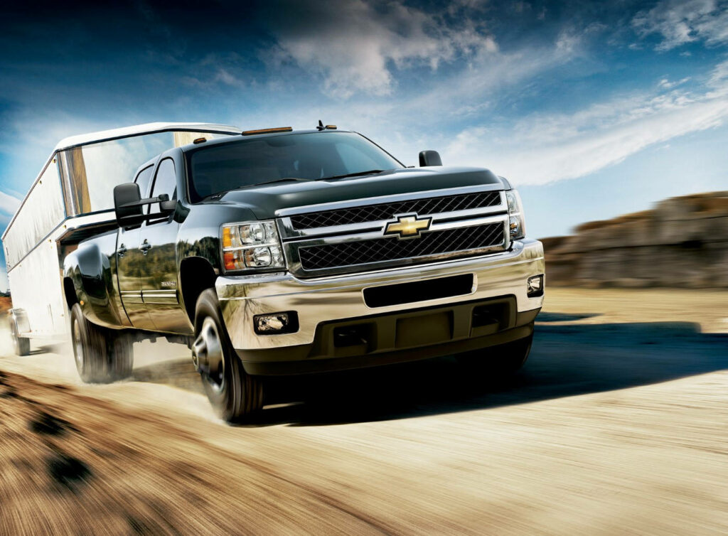 Capturing the Duramax Beast Under a Radiant Blue Sky Wallpaper