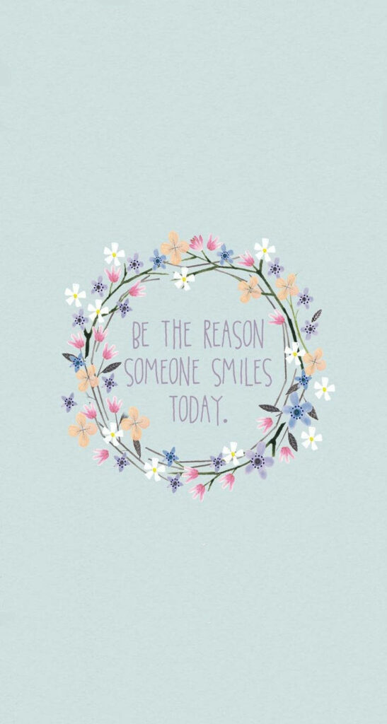 Uplifting Floral Wallpaper: 'Be the Reason Someone Smiles' Background