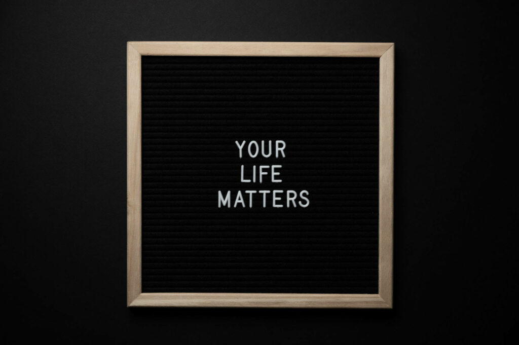 Minimalist Wallpaper: 'Your Life Matters' on Dark Background
