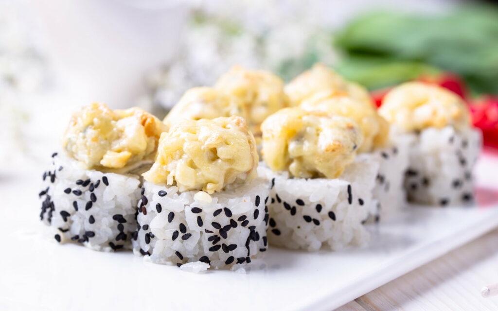 Succulent Uramaki Delight: A Captivating Asian Feast in Vibrant Bokeh Bliss Wallpaper