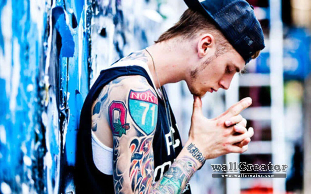 Stylish Wallpaper: Machine Gun Kelly in Urban Fashion & Graffiti