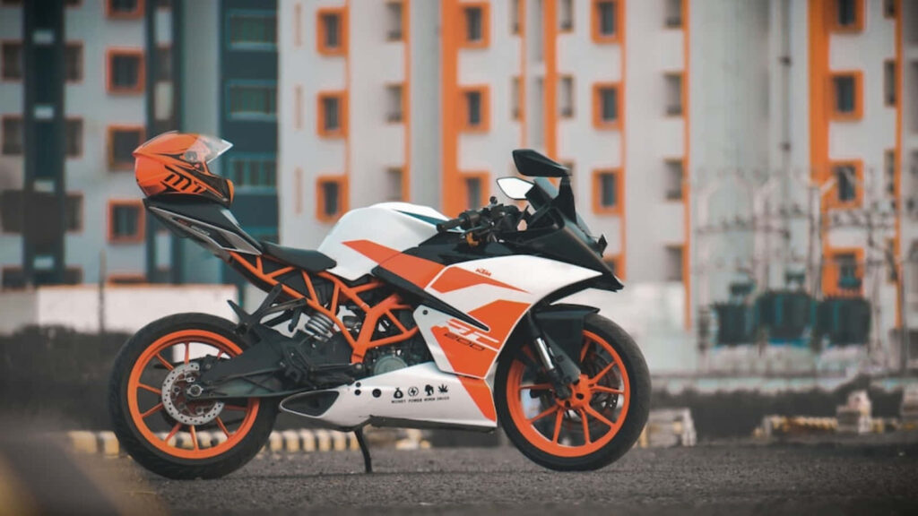 KTM RC Motorcycle Wallpaper: Bold, Sporty Design & Urban Backdrop