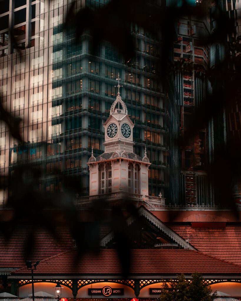 Urban City Wallpaper: Historic Clock Tower & Modern Skyscrapers Background