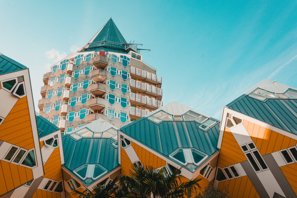 Vibrant Urban Wallpaper: Modern Architecture in Yellow & Teal