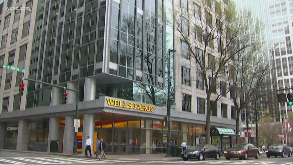 Wells Fargo Building Wallpaper: Urban Scene with Trees and Pedestrians