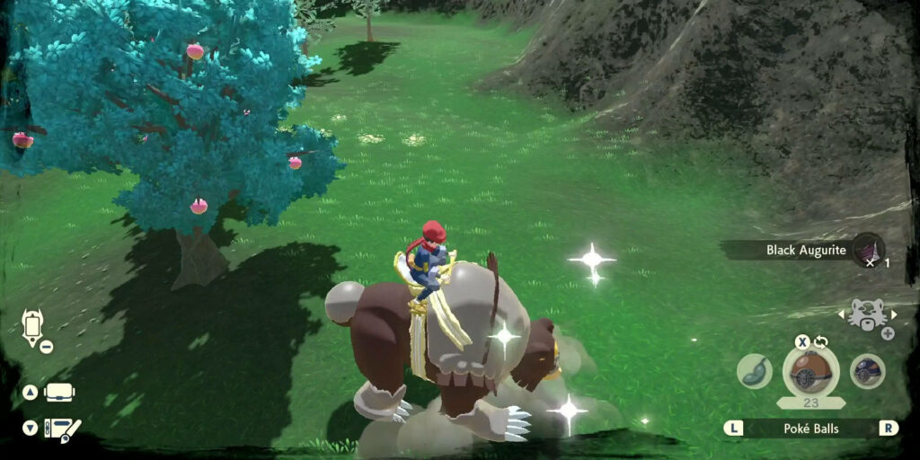 Player riding Ursaluna in lush green field discovering hidden treasure with sparkling effects wallpaper