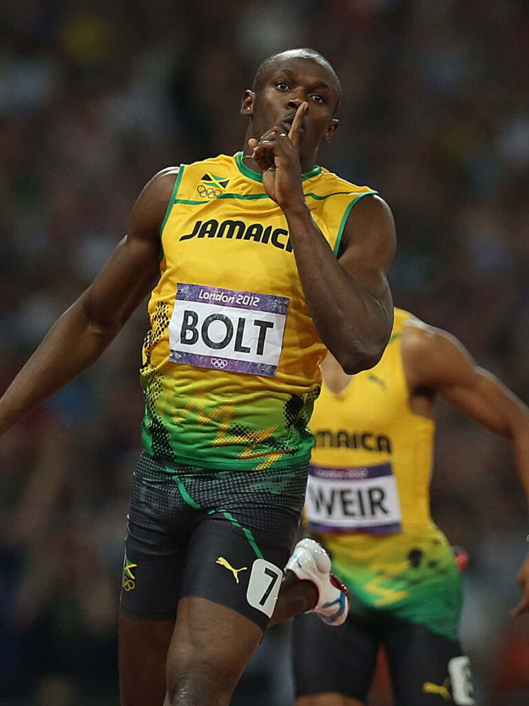 Usain Bolt celebrating victory during a race showing speed confidence Jamaican athlete wallpaper