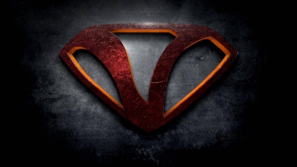 3D CGI metallic red V emblem in diamond frame with golden lighting sci fi V series wallpaper