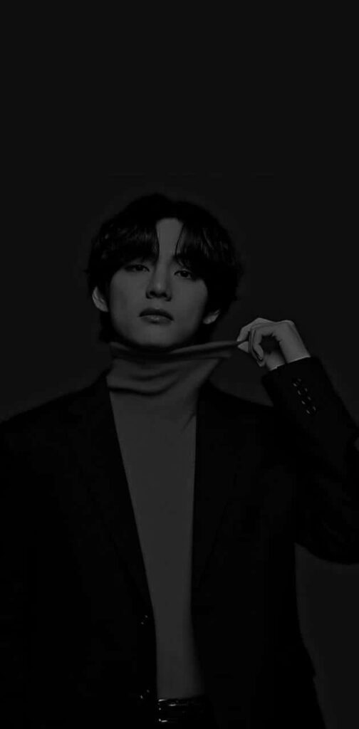 V from BTS dark mode wallpaper sharp features minimalistic sophisticated phone background