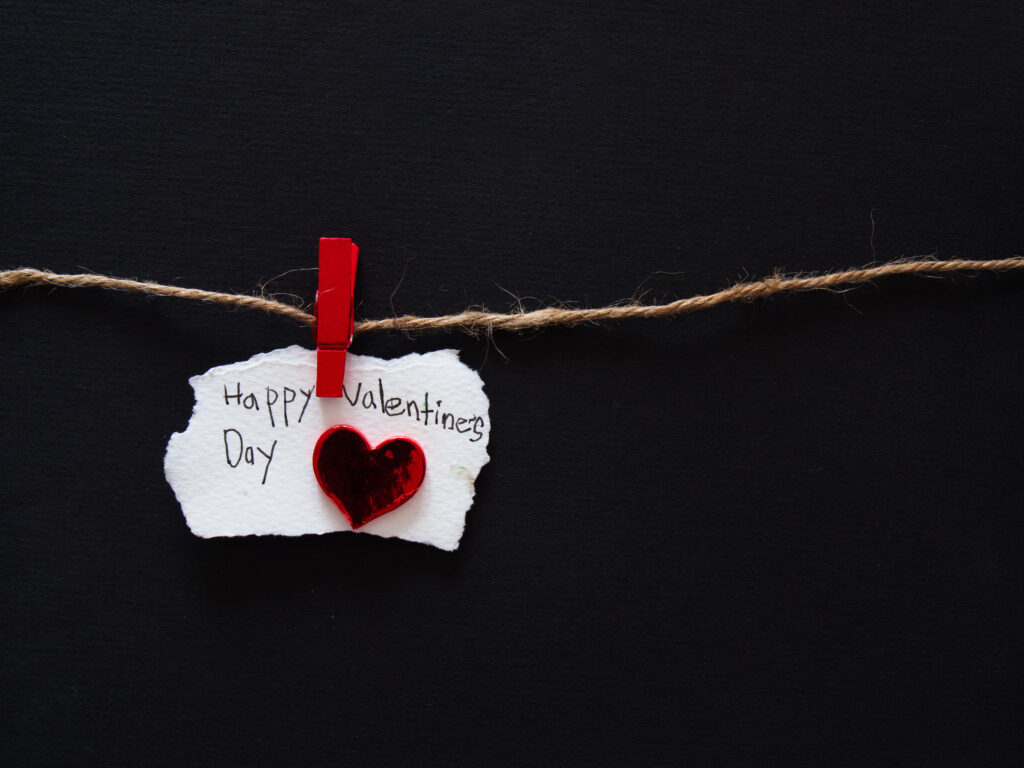 Valentine's Day Wallpaper: Black Background with Heart & Torn Paper