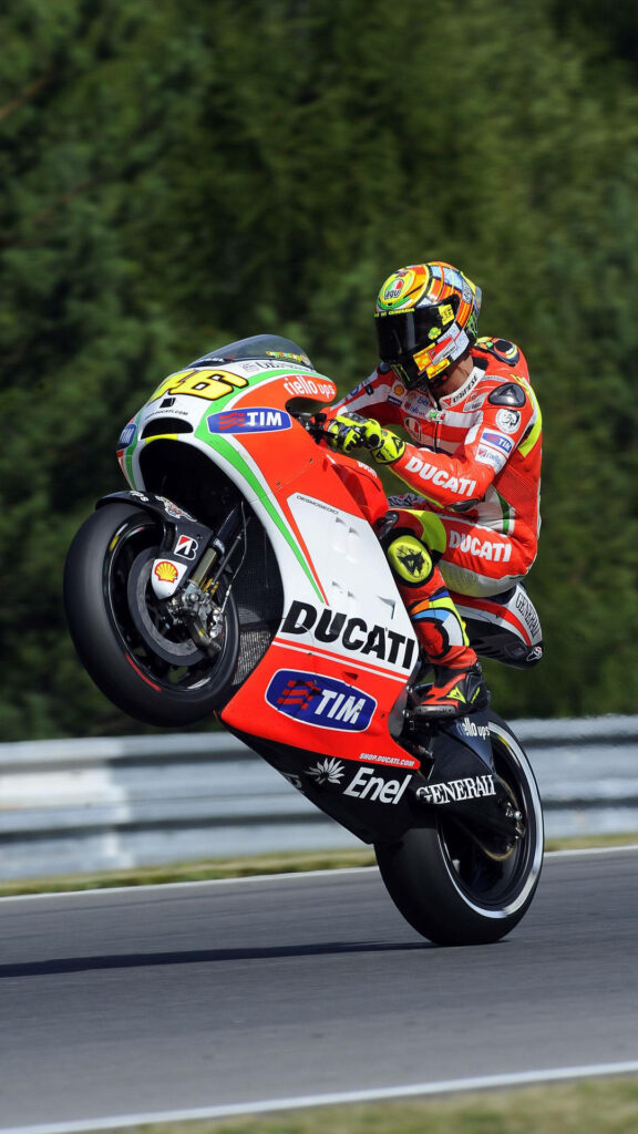 Stunning Valentino Rossi Ducati GP11 Wheelie Wallpaper for Motorsports Fans
