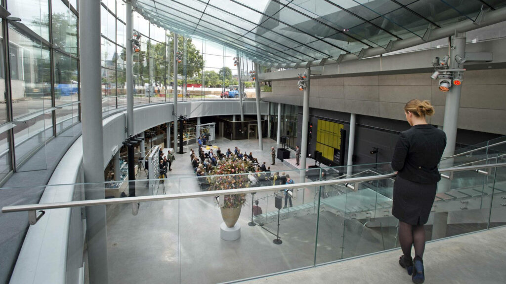 Stunning Van Gogh Museum Interior with Staff & Event Space View Wallpaper