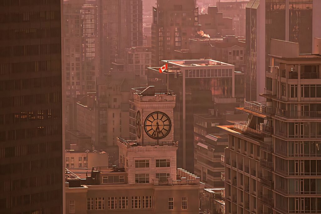 Vancouver Block Building clock tower sepia cityscape with downtown high-rises wallpaper background