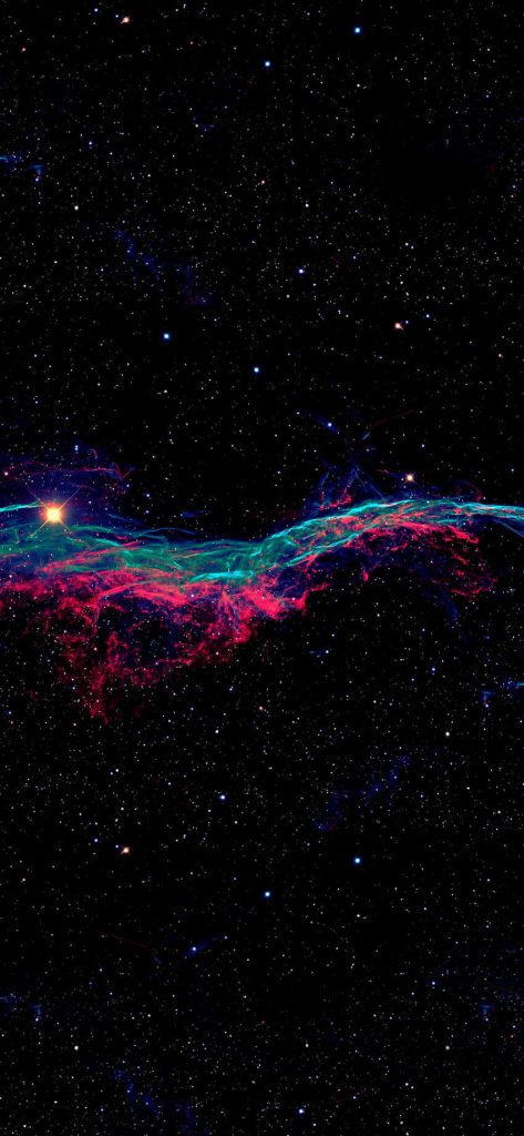 Vibrant Veil Nebula OLED wallpaper with red cyan filaments on deep black starry background
