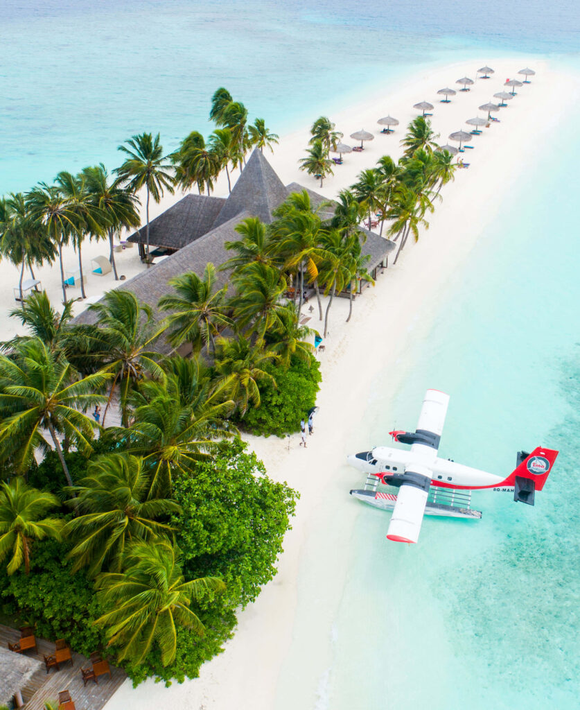Veligandu Island Wallpaper: Floatplane & Tropical Paradise Background