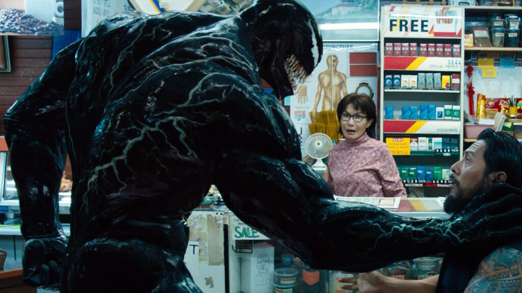 Venom vs. Eddie Brock: Dynamic Wallpaper in Mrs. Chen's Store