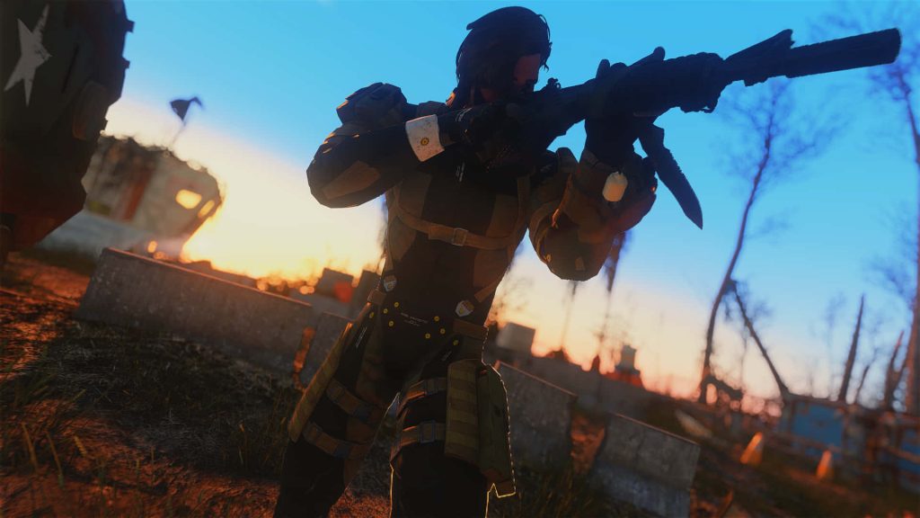 Venom Snake in tactical gear with suppressed rifle at golden sunset post-apocalyptic scene Wallpaper