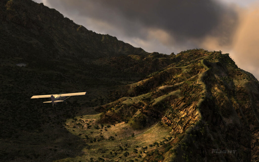 Aerial Snapshot: Majestic Landscapes Capturing the Microsoft Flight Simulator's RV-10 Aircraft Soaring Across Lush Greenery Wallpaper