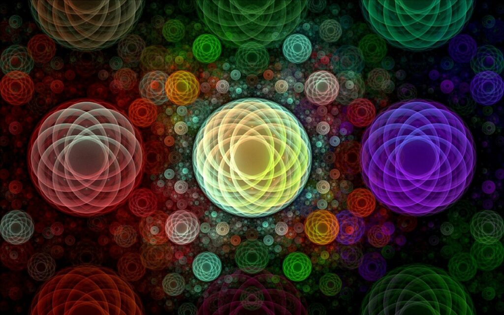 Vibrant Multi-Colored Circle Wallpaper on Dark Background
