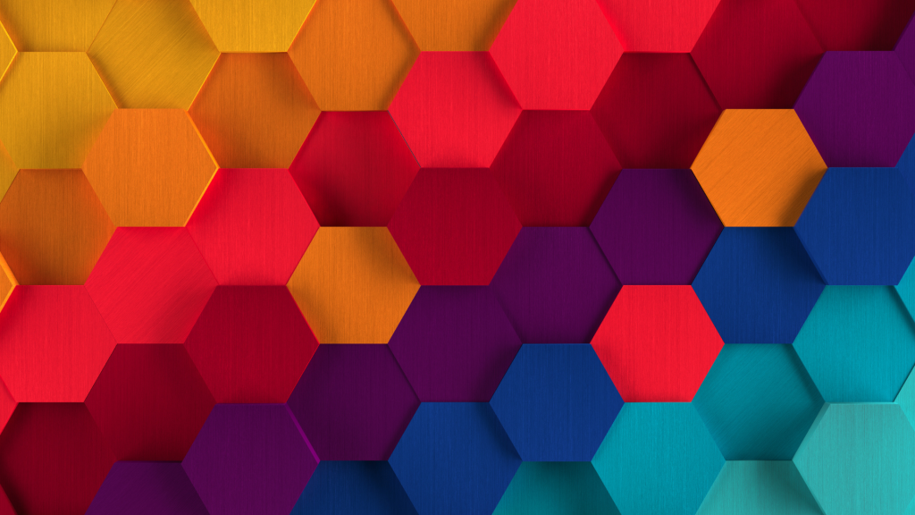 Vibrant 3D hexagonal tile wallpaper with gradient spectrum and brushed metal texture background