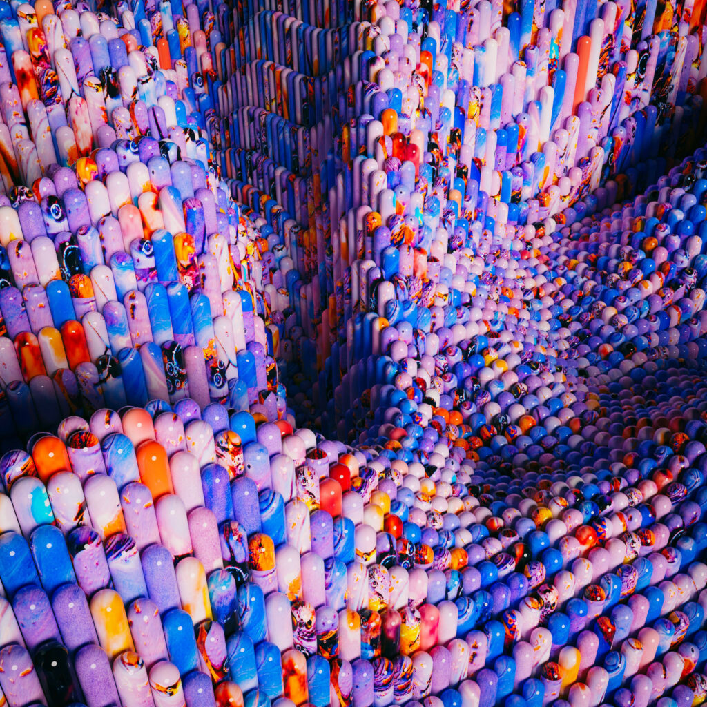 Colorful 3D Relief Wallpaper: Dynamic Pill-Shaped Design Background