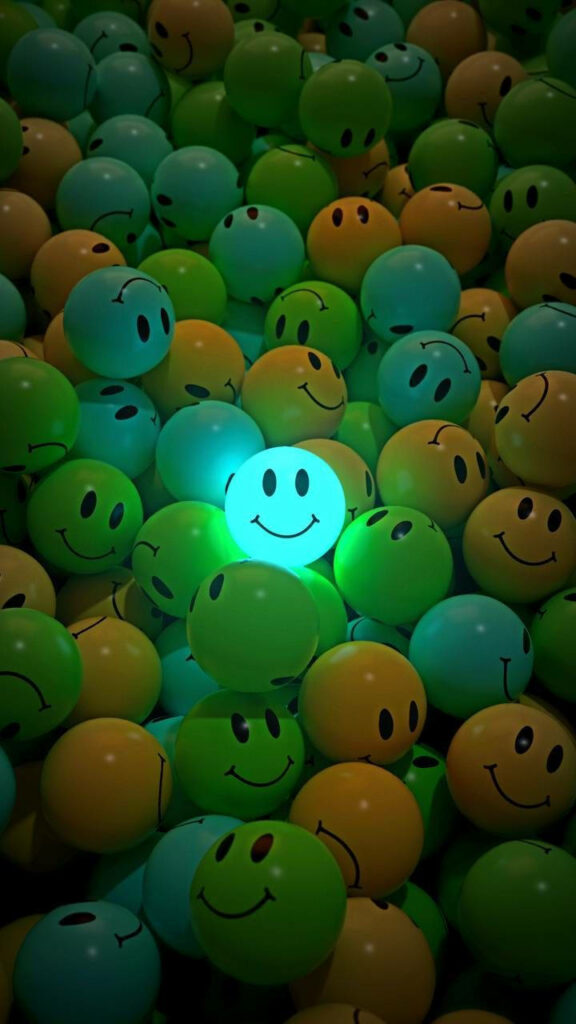 Vibrant 3D Smiley Balls Wallpaper for a Cheerful Phone Background