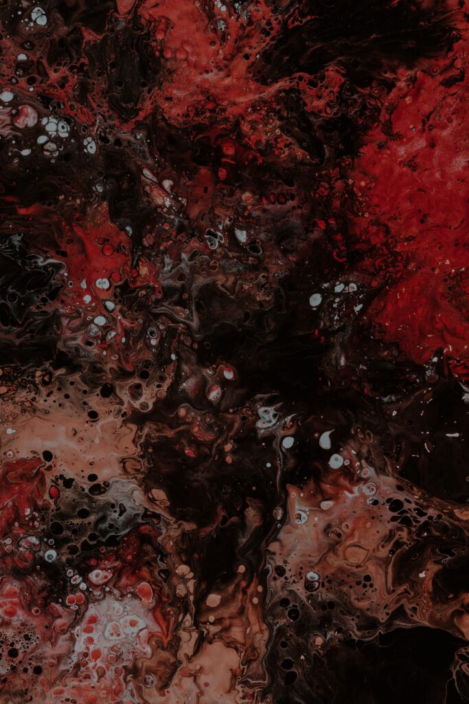 Vibrant Abstract Wallpaper: Colorful Liquid Stains in Red, Black, White