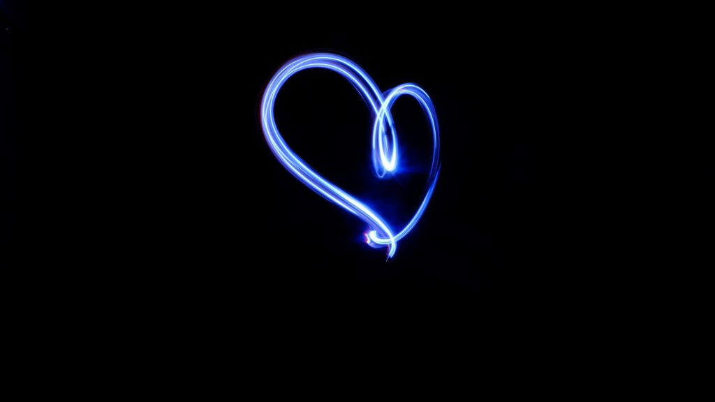 Glowing Blue Heart LED Light Wallpaper - 4K Minimalist Design
