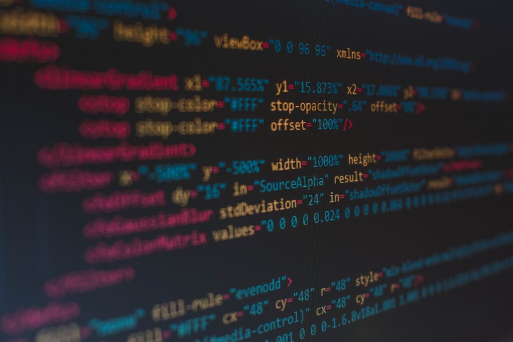 Vibrant Tech-Inspired Wallpaper: Colorful Code with Blur Effect