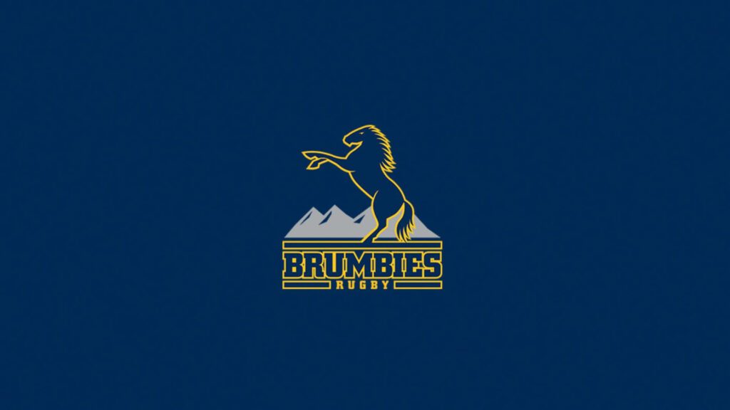 Vibrant ACT Brumbies wallpaper with gold horse logo rearing over blue mountains and rugby text