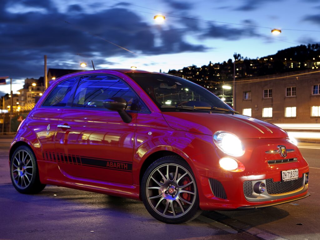 Vibrant Abarth 695 Tributo Ferrari Wallpaper - Stylish Urban Design