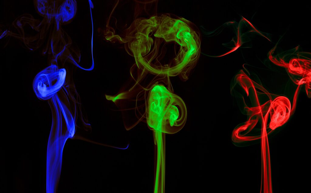 Vibrant 3D Abstract Wallpaper: Colorful Smoke Designs on Black