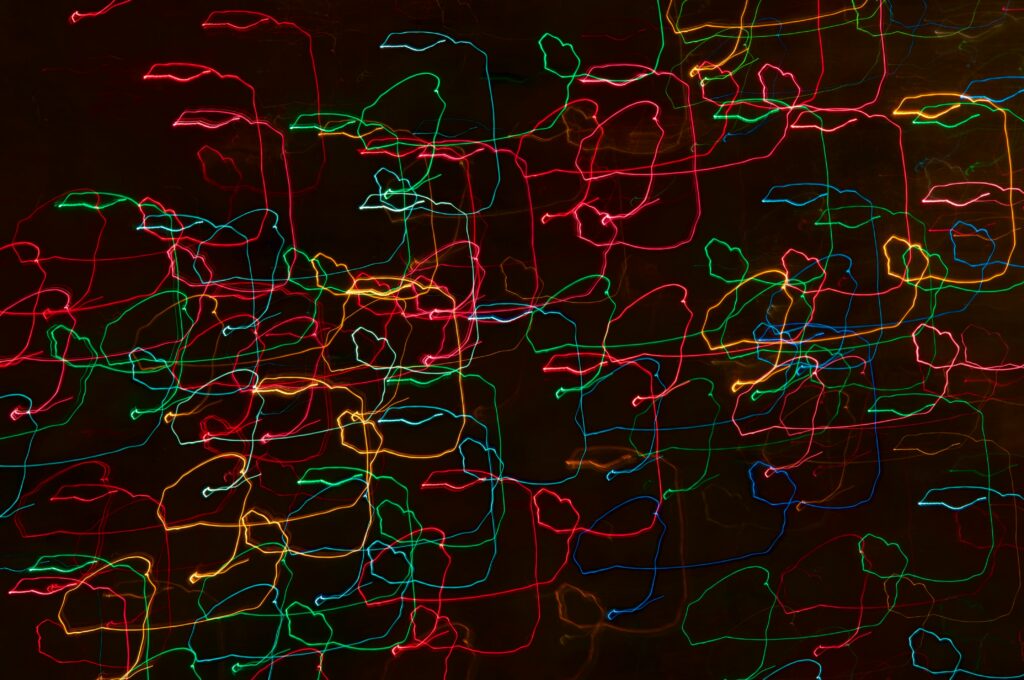 Vibrant Abstract Wallpaper: Colorful Lines on Dark Background