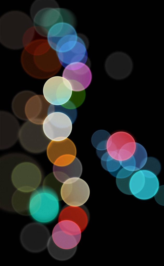 Vibrant abstract bokeh lights on black background modern colorful iPhone wallpaper design
